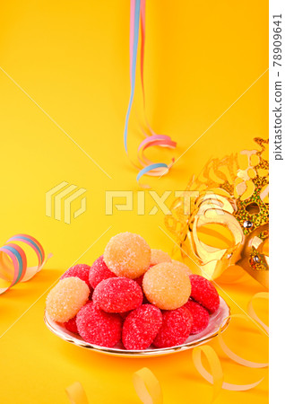 Baked castagnole. Traditional sweet pastries during the carnival period in italy. Street food, round 78909641