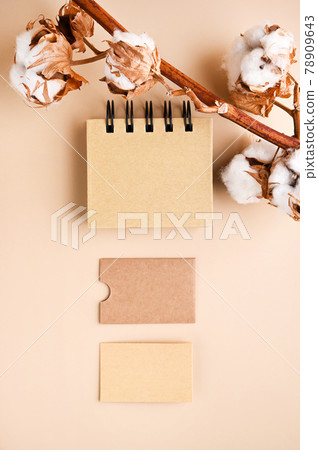 Business card mockup, eco kraft paper on a beige background Business card mockup, eco kraft paper on a beige background 78909643