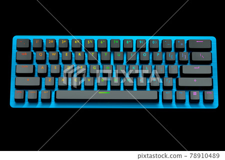 Blue computer keyboard with rgb colors isolated on black background. Blue computer keyboard with rgb colors isolated on black background. 78910489