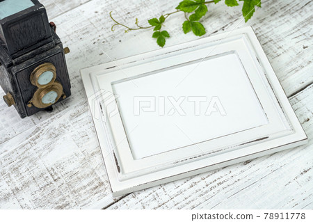 Old camera and photo frame 78911778