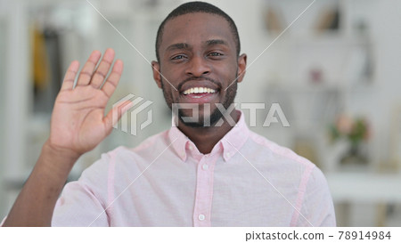 Portrait of Attractive African Man Talking on Video Call  78914984