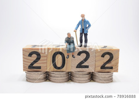 a mini elderly people sitting on cube a mini elderly people sitting on cube 78916888