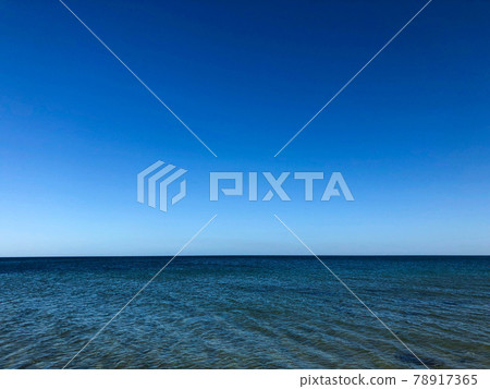 Sea water waves and beautiful blue sky at Brighton beach in Melbourne, Australia. 78917365