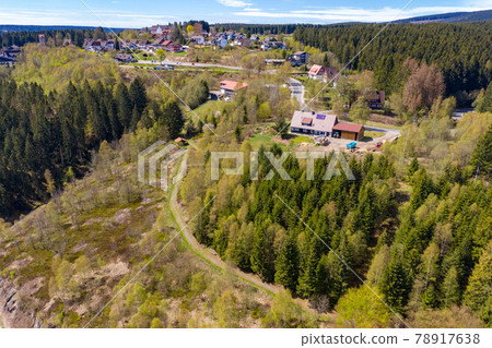 Aerial view of a village in the Harz mountains lying on a plateau Aerial view of a village in the Harz mountains lying on a plateau 78917638