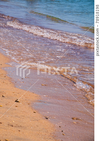 Soft wave of the sea on the sandy beach. Soft wave of the sea on the sandy beach. 78918198