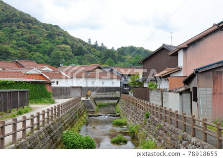 Cityscape of Kurayoshi White Wall Warehouses with a river 78918655