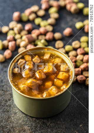 Canned pet food and dried kibble. Tasty food for dog or cat. 78918762