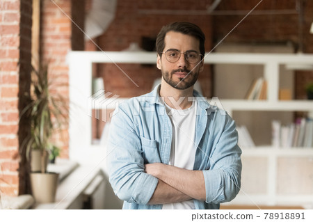 Portrait of confident young millennial generation businessman. 78918891