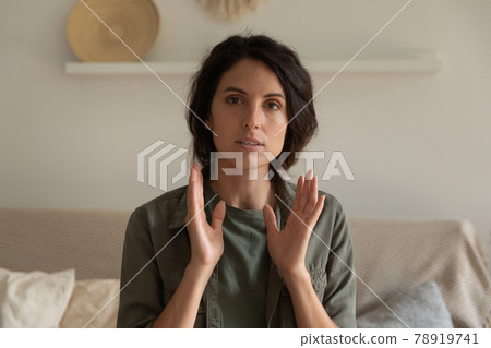 Head shot portrait of woman speaking at camera, video call Head shot portrait of woman speaking at camera, video call 78919741