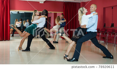 Couples enjoying tango Couples enjoying tango 78920611