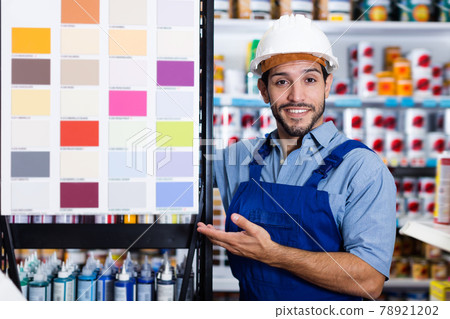 Adult foreman showing samples of paint Adult foreman showing samples of paint 78921202