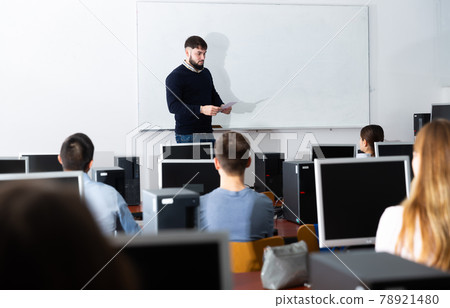 Teacher gives lecture in the classroom 78921480
