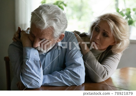 Caring old wife comfort unhappy mature husband after fight 78921879
