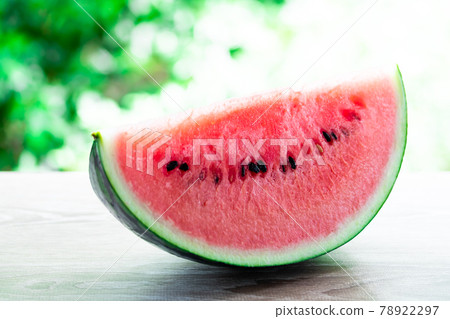 Hydrate with watermelon on hot days 78922297