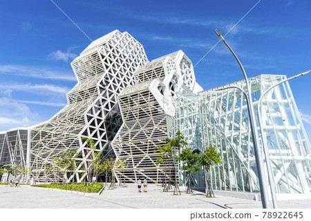Kaohsiung Music Center with the view from Love River. The white hexagonal building structure on the riverbank in Kaohsiung, Taiwan. Kaohsiung Music Center with the view from Love River. The white hexagonal building structure on the riverbank in Kaohsiung, Taiwan. 78922645