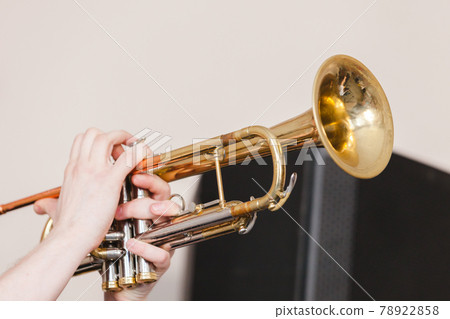 Trumpet in musician hands 78922858