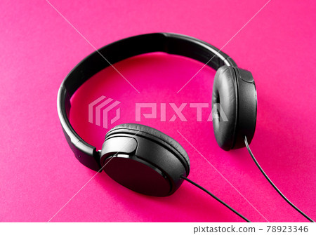 Headphones on a pink background 78923346