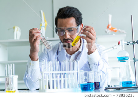 Male Scientist Looking Vaccine 78926233
