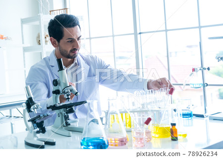 Male Scientist Looking Vaccine Male Scientist Looking Vaccine 78926234