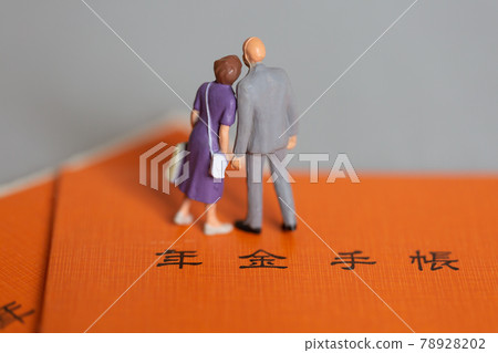 Elderly couple and pension book Image of money in retirement 78928202