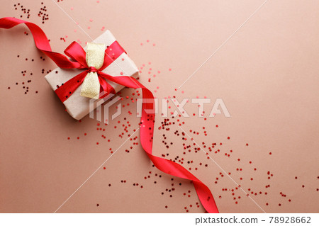 Christmas gifts, presents, ornaments on beige holiday background. Black friday luxury stylish greeting card, thanksgiving. Winter xmas holiday theme. Happy New Year 2022, banner Christmas gifts, presents, ornaments on beige holiday background. Black friday luxury stylish greeting card, thanksgiving. Winter xmas holiday theme. Happy New Year 2022, banner 78928662