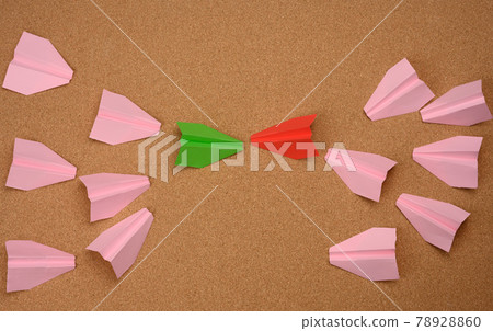 two large groups of paper airplanes on a brown background. Conflict of interest 78928860