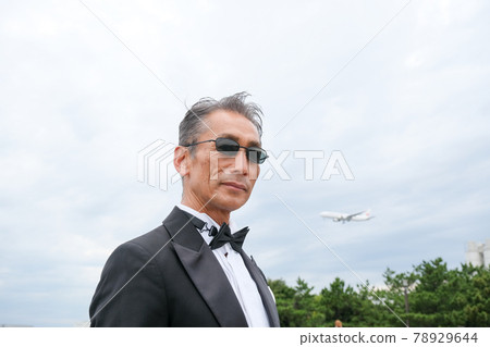Male in a black tie wearing sunglasses Japanese senior, middle Male in a black tie wearing sunglasses Japanese senior, middle 78929644