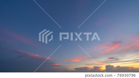 Sunset sky. Abstract nature background. Dramatic blue with orange colorful clouds in twilight time. Sunset sky. Abstract nature background. Dramatic blue with orange colorful clouds in twilight time. 78930796