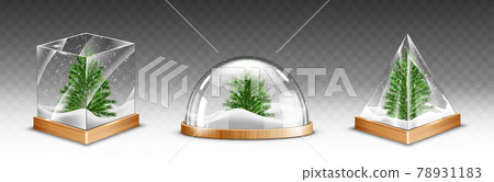 Snow globes with christmas tree on wooden base 78931183