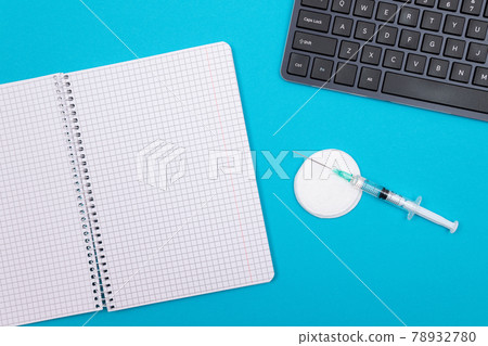 Vaccination or Revaccination Concept - Three Insulin Syringe on Blue Table Vaccination or Revaccination Concept - Three Insulin Syringe on Blue Table 78932780