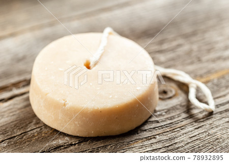 Handmade shampoo or soap bar on wooden background Handmade shampoo or soap bar on wooden background 78932895