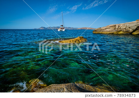 Yacht boat at Sarakiniko Beach in Aegean sea, Milos island , Greece 78934873