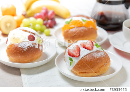 3 kinds of maritozzo on the table and coffee 78935653