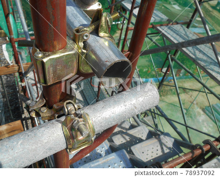 SELANGOR, MALAYSIA -NOVEMBER 10, 2016: Scaffolding connector detail at the construction site. The connector bind or tie scaffolding or safety pipe together.  78937092