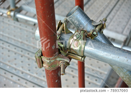 SELANGOR, MALAYSIA -NOVEMBER 10, 2016: Scaffolding connector detail at the construction site. The connector bind or tie scaffolding or safety pipe together.  78937093
