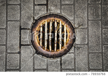 A tile pattern that lines up vertically with a decaying drainage ditch A tile pattern that lines up vertically with a decaying drainage ditch 78938768