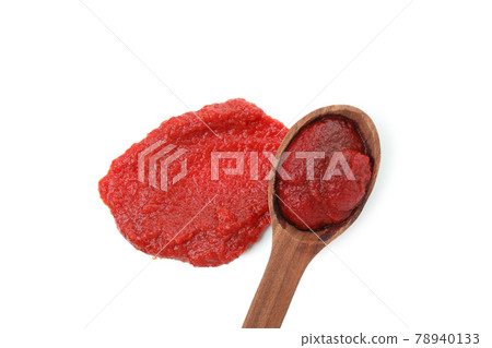 Spoon with tomato paste isolated on white background 78940133