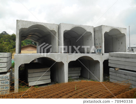 SELANGOR, MALAYSIA -DECEMBER 02, 2016: U-Shape precast concrete drain stored at the construction site.  78940338