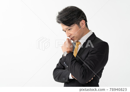 Businessman middle man thinking 78940823
