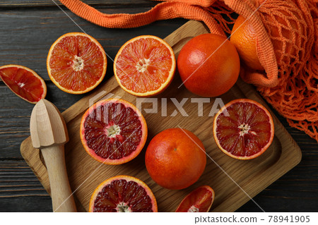 Concept of citrus with red oranges on wooden table Concept of citrus with red oranges on wooden table 78941905