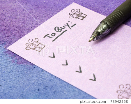 Handwritten note with to buy list for holidays Handwritten note with to buy list for holidays 78942368