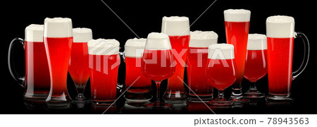Set of fresh draft beer glasses with bubble froth isolated on black background. Set of fresh draft beer glasses with bubble froth isolated on black background. 78943563