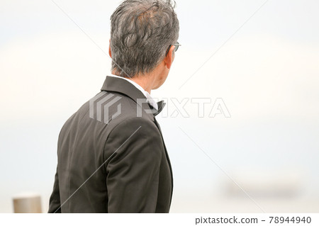 Male in black tie, back view Male in black tie, back view 78944940