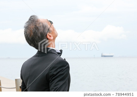 Male in black tie, back view Male in black tie, back view 78944951