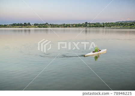 evening canoe paddling in Colorado 78946225