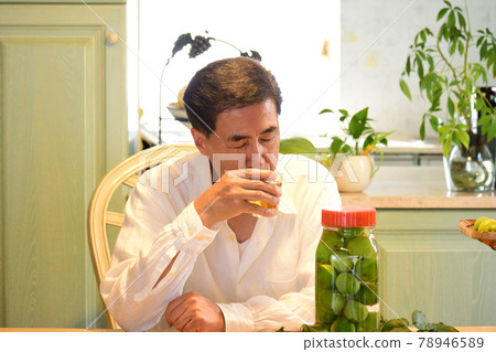 Senior man drinking Umesh 78946589