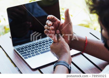 black man holding his wrist pain black man holding his wrist pain 78950321