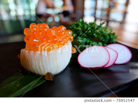 Engawa Sushi Roll topped with Salmon roe. Japanese food Engawa Sushi Roll topped with Salmon roe. Japanese food 78952547
