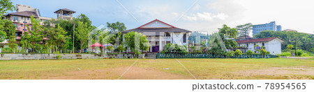 Labuduwa Siridhamma College playground and the Auditorium building with hostels on the side. 78954565
