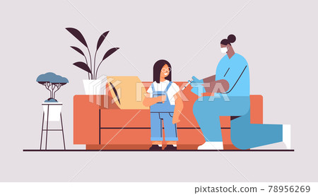 female doctor in mask vaccinating little child patient fight against coronavirus vaccine development concept 78956269